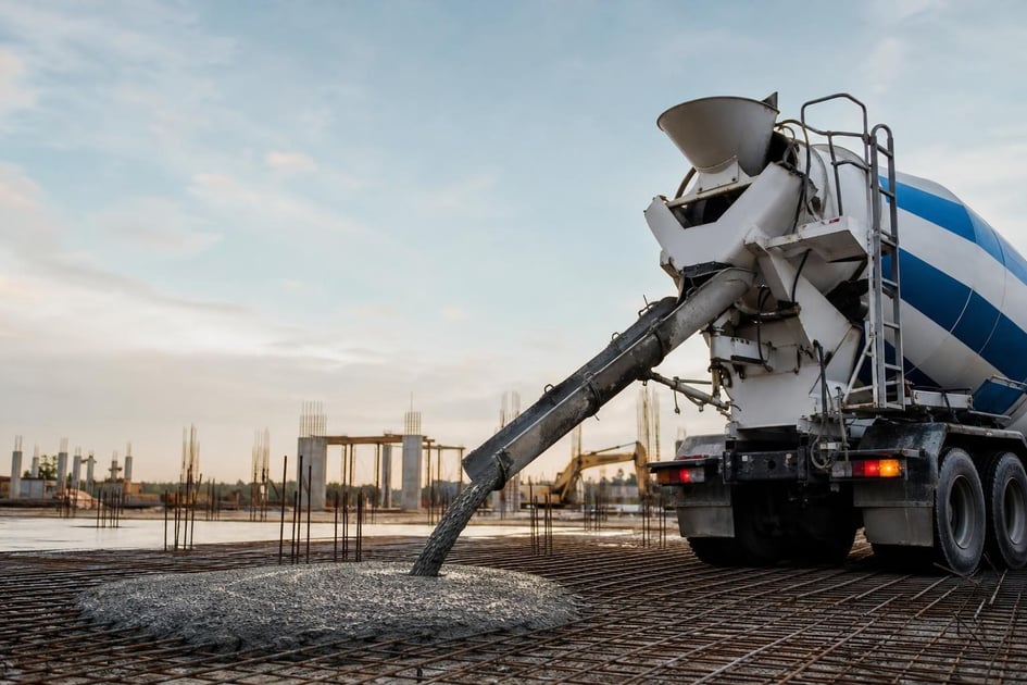 Concrete mixer truck at a commercial worksite, illustrating concrete mixer financing qualify for: what to expect