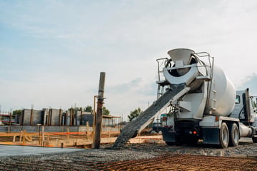 Concrete mixer at a commercial worksite, illustrating concrete mixer financing with no down payment: what to expect