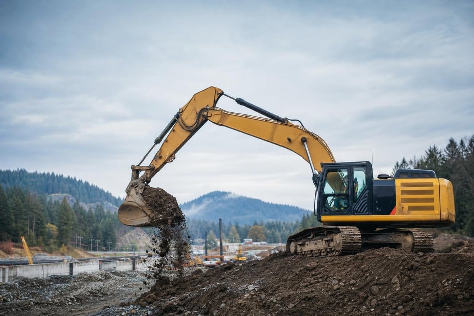 Excavator at a commercial worksite, illustrating equipment financing in oregon: rates, terms and how to qualify