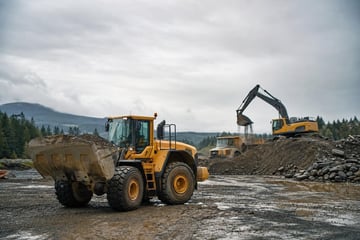 Excavator at a commercial worksite, illustrating equipment financing in washington: rates, terms and how to qualify