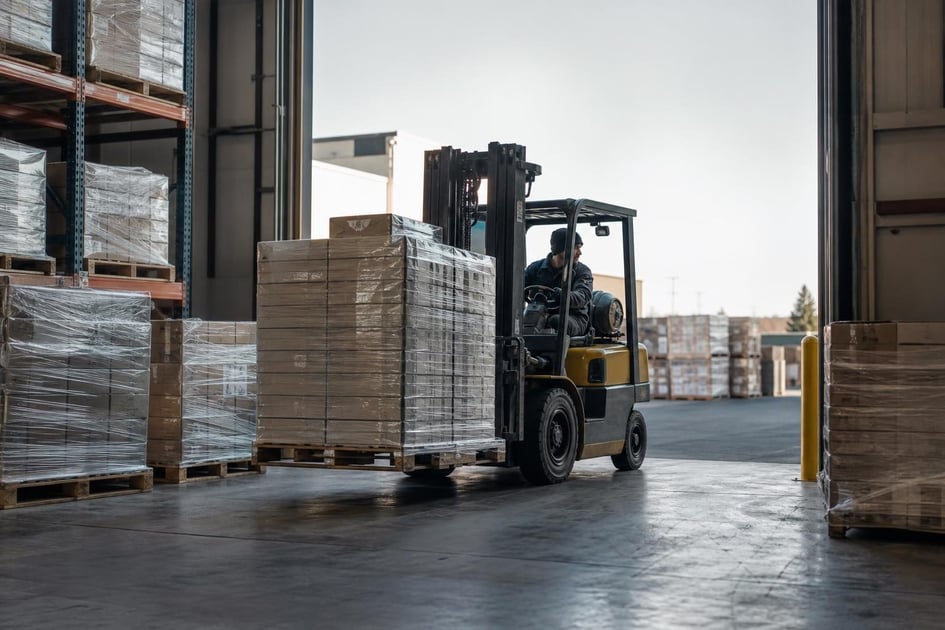 Forklifts at a commercial worksite, illustrating forklifts financing for small business: what to expect
