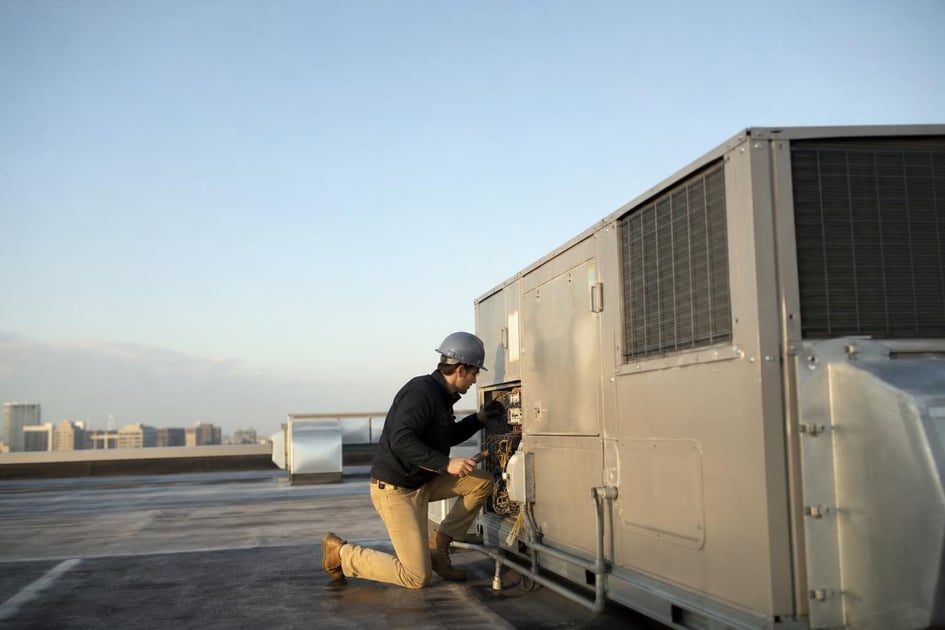 Commercial hvac rooftop unit at a commercial worksite, illustrating hvac equipment financing rates: what owner-operators actually pay