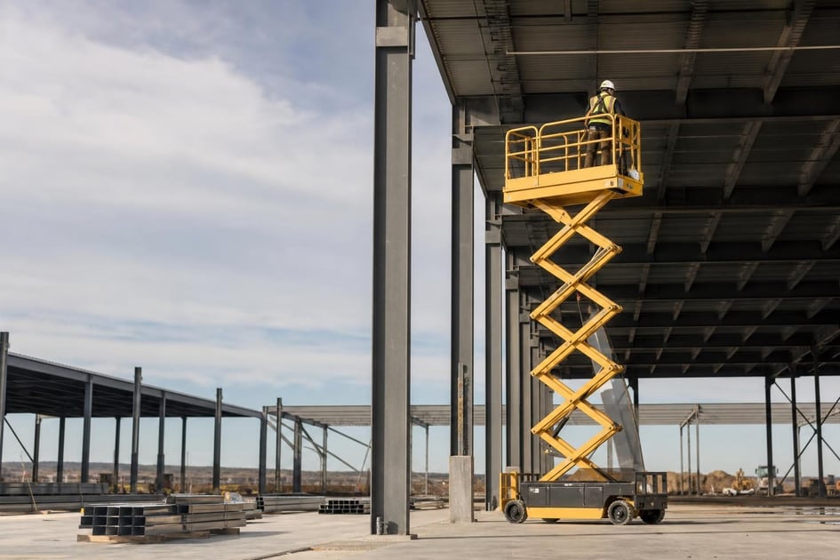 Scissor lift at a commercial worksite, illustrating scissor lifts financing requirements: what to expect