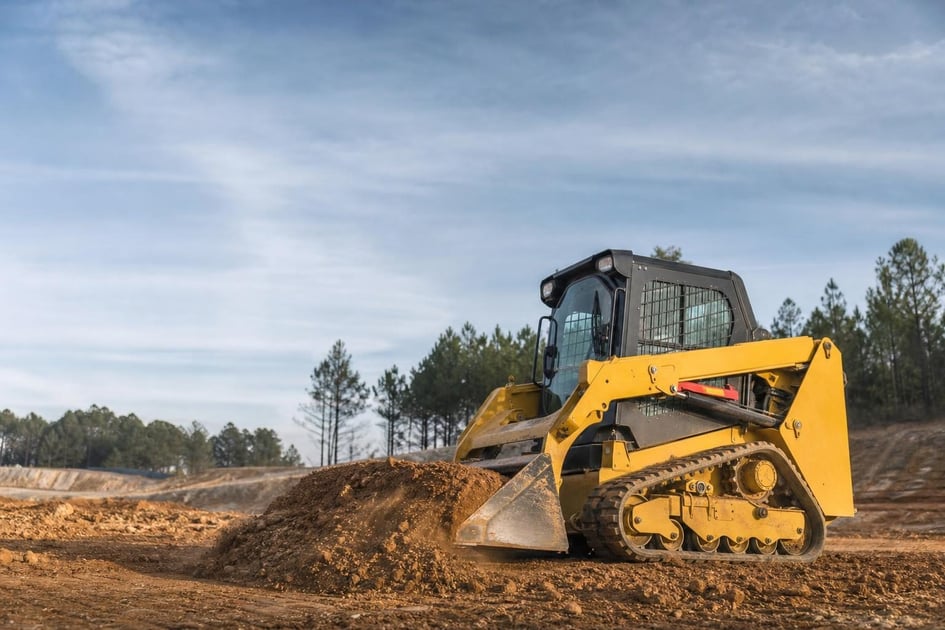 Skid steer loader at a commercial worksite, illustrating skid steers financing in north carolina