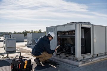 Used commercial hvac rooftop unit at a commercial worksite, illustrating used hvac equipment financing: what contractors need to know
