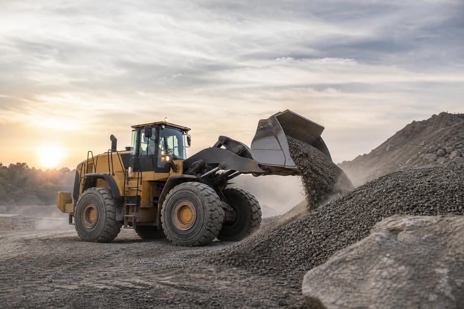 Wheel loader at a commercial worksite, illustrating wheel loaders financing rates: what to expect