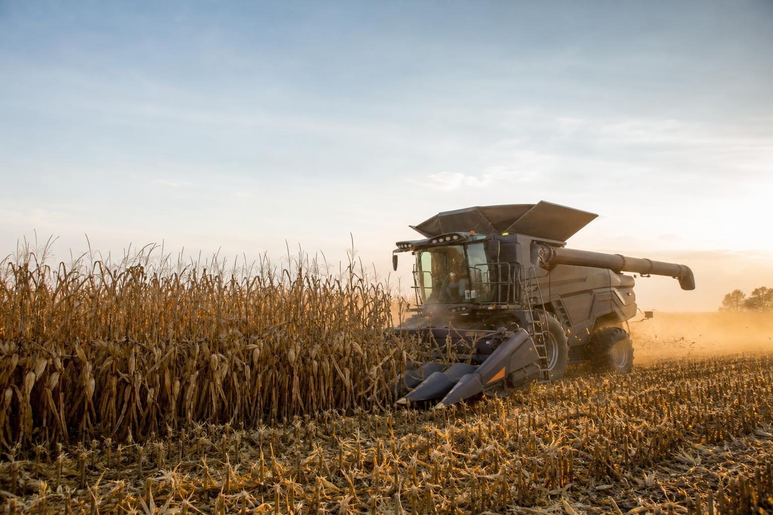 Used combine harvester at a commercial worksite, illustrating combines financing used: what to expect